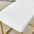 Table And Chair Set.A Modern Minimalist Style Round Clear Tempered Glass Table With Metal Legs.Paried With White Chairs With Modern Pu Leather High Back Upholstered And C Tube Golden Legs. Transparent Seats 6 Glass