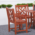 Lidwina Reddish Brown Tropical Wood Patio Armchair Natural Wood Wood Eucalyptus
