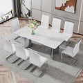 Modern Minimalist Dining Table. The White Imitation Marble Glass Desktop Is Equipped With Silver Metal Legs. Suitable For Restaurants And Living Rooms 71