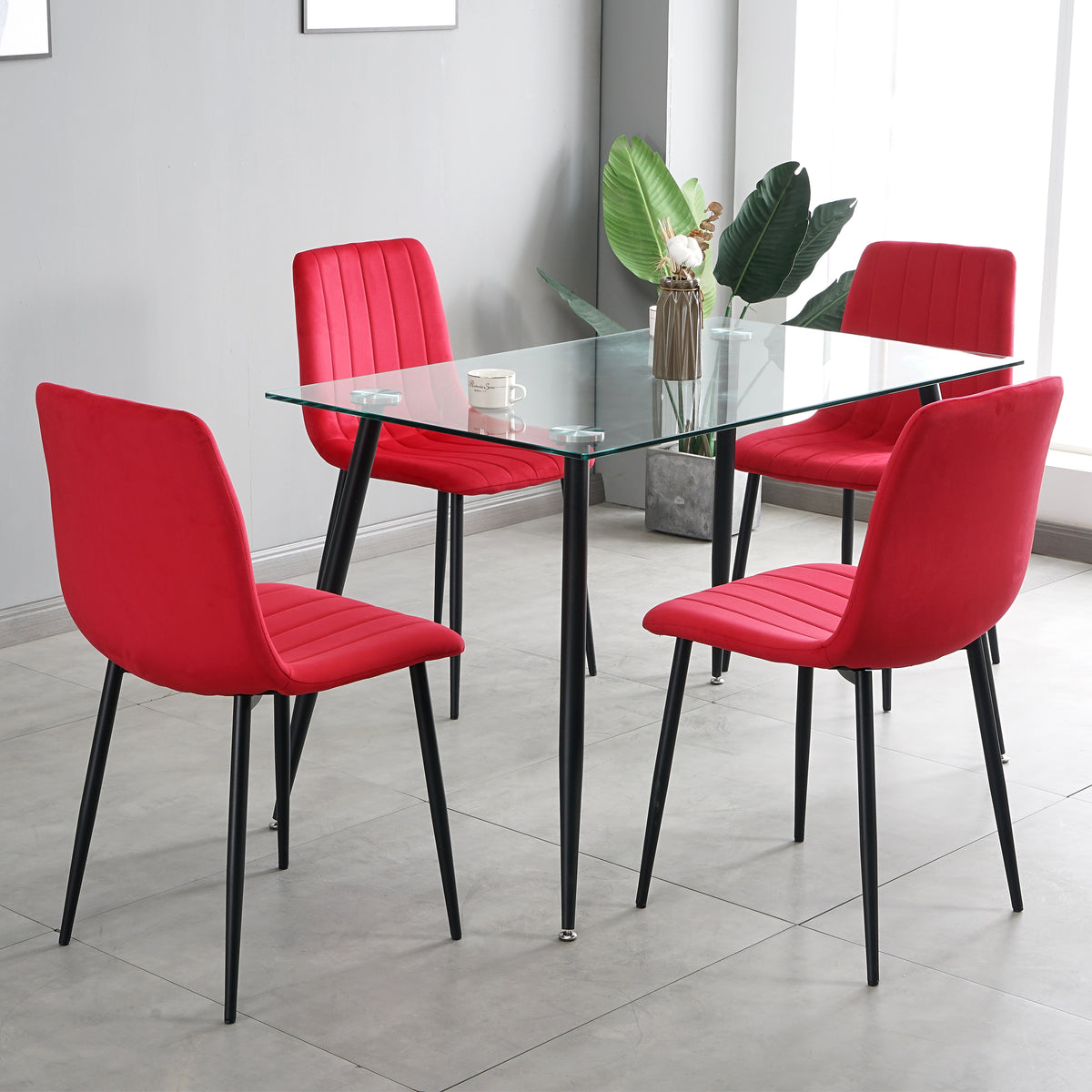 Table And Chair Set, One Table And Four Chairs. Clear Tempered Glass Table Top, 0.3 Feet Thick, Black Wrought Iron Legs. Black Spray Paint Chair Legs. Upholstered Chair Glass Red Metal Rectangular