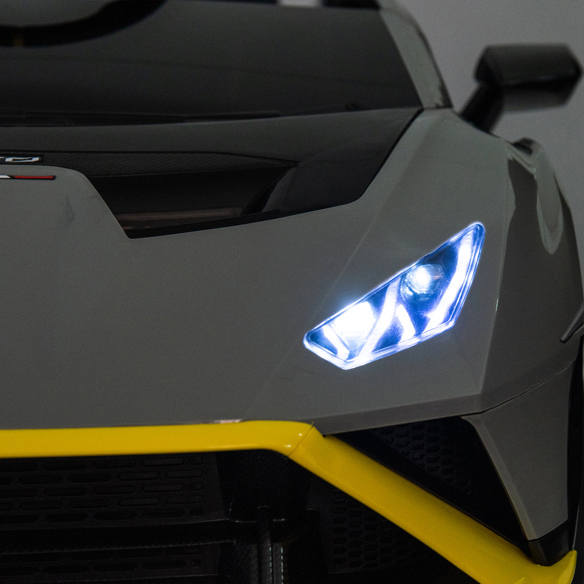 Lamborghini Huracan Sto 24V Kids Electric Ride On Drift Car: Speeds 1.86 5.59 Mph, Ages 3 8, Foam Front Wheels, 360 Spin, Led Lights, Dynamic Music, Early Learning, Usb Port, Drift Feature Gray Polypropylene