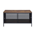 Antique Oak And Black Coffee Table With 4 Sliding Doors Black Brown Primary Living Space Rustic Shelves Rectangular Wood