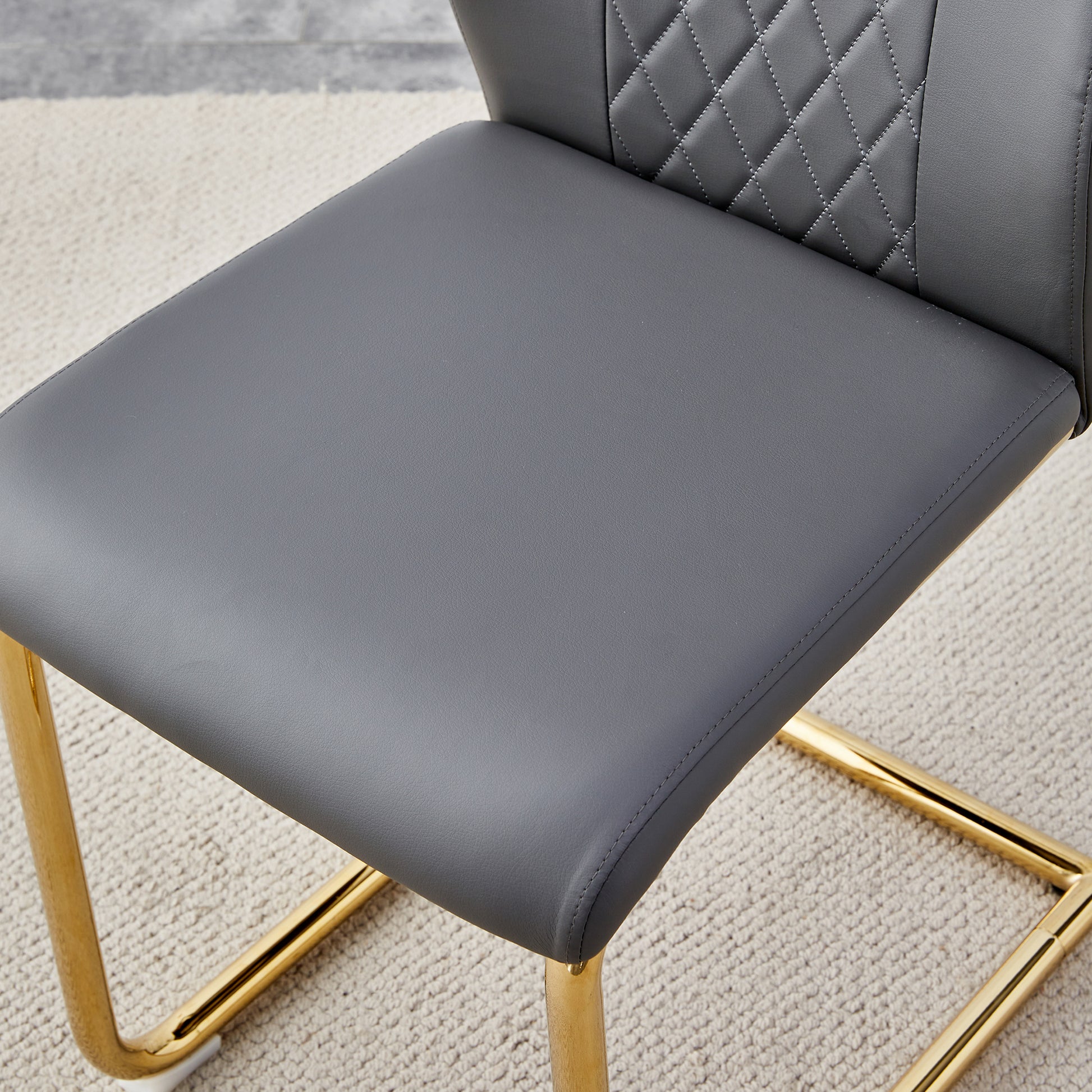 Table And Chair Set.The Table Has A Glass Tabletop With Imitation Marble Pattern Stickers And Stainless Steel Golden Table Legs. Paried With Comfortable Chairs With Pu Seats And Metal Legs. White Gold Seats 6 Glass Metal