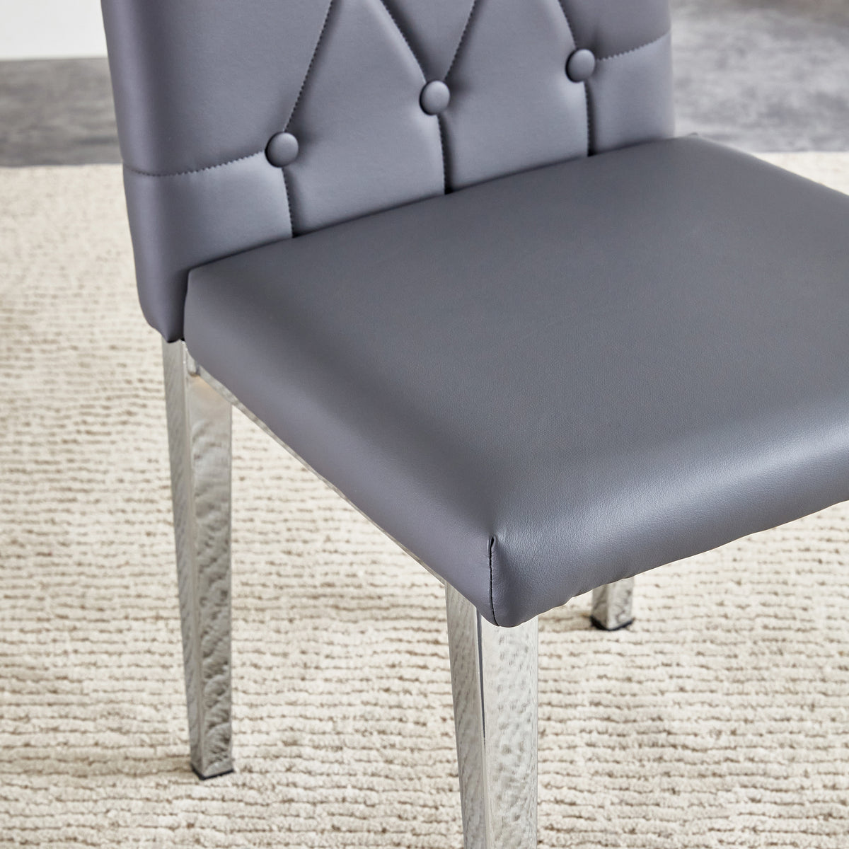 2 Piece Set Of Gray Armless Dining Chairs Brings A Touch Of Elegance And Mystery To The Dining Area With Its Deep Gray Tone,The Grid And Buckle Design Of The Back Add A Vintage Yet Fashionable Touch Gray Set Of 2 Pu